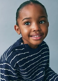 Striped knit sweater with lace accents