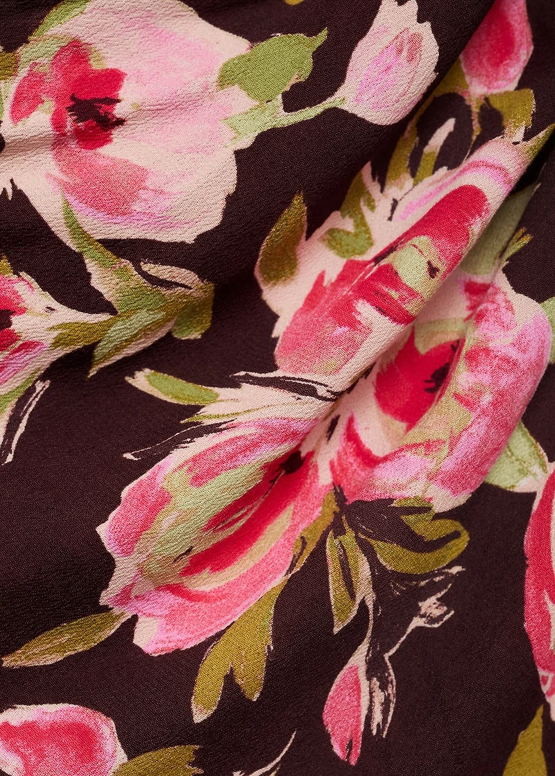 Floral blouse with asymmetrical neck