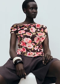 Floral blouse with asymmetrical neck