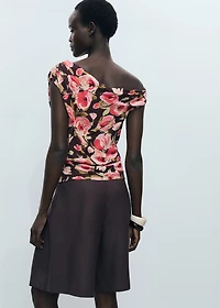 Floral blouse with asymmetrical neck