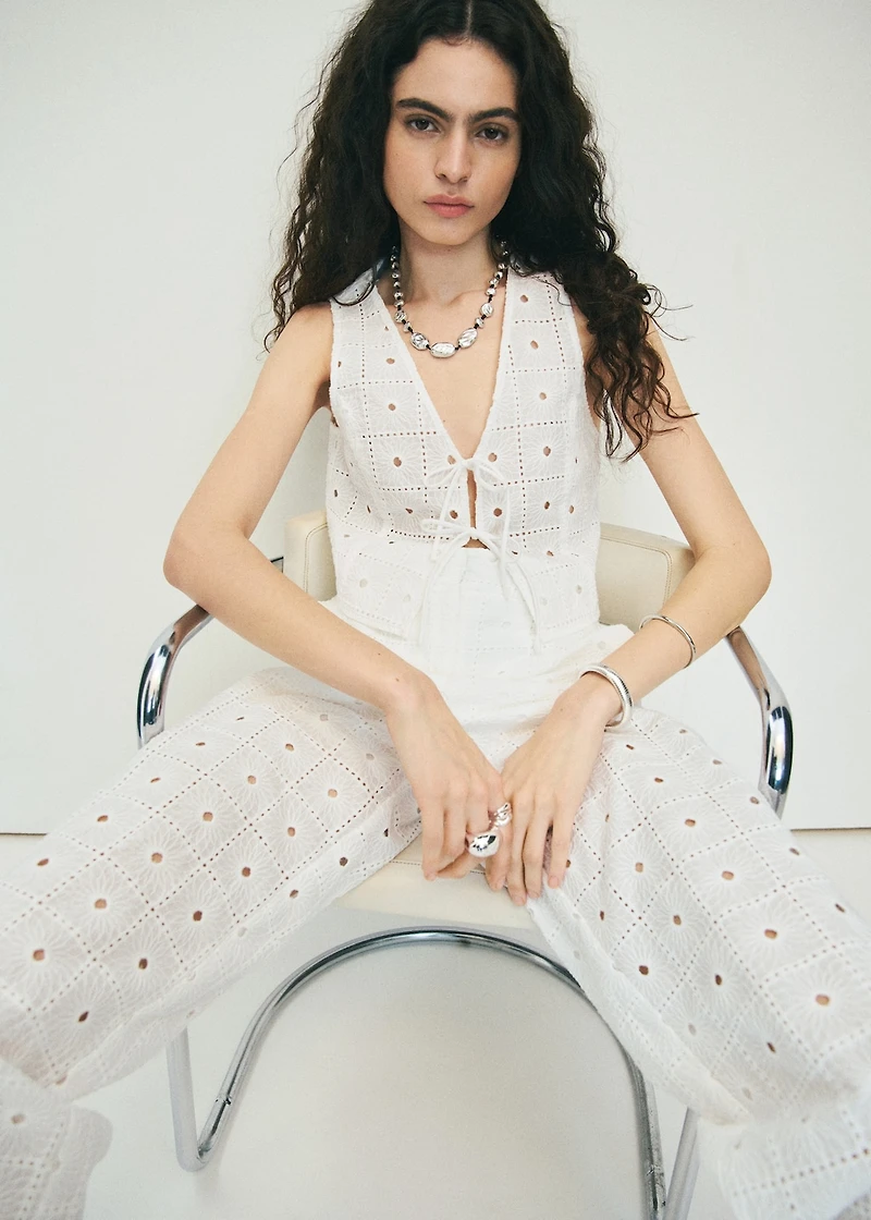 Embroidered cotton vest with bows