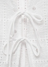 Embroidered cotton vest with bows