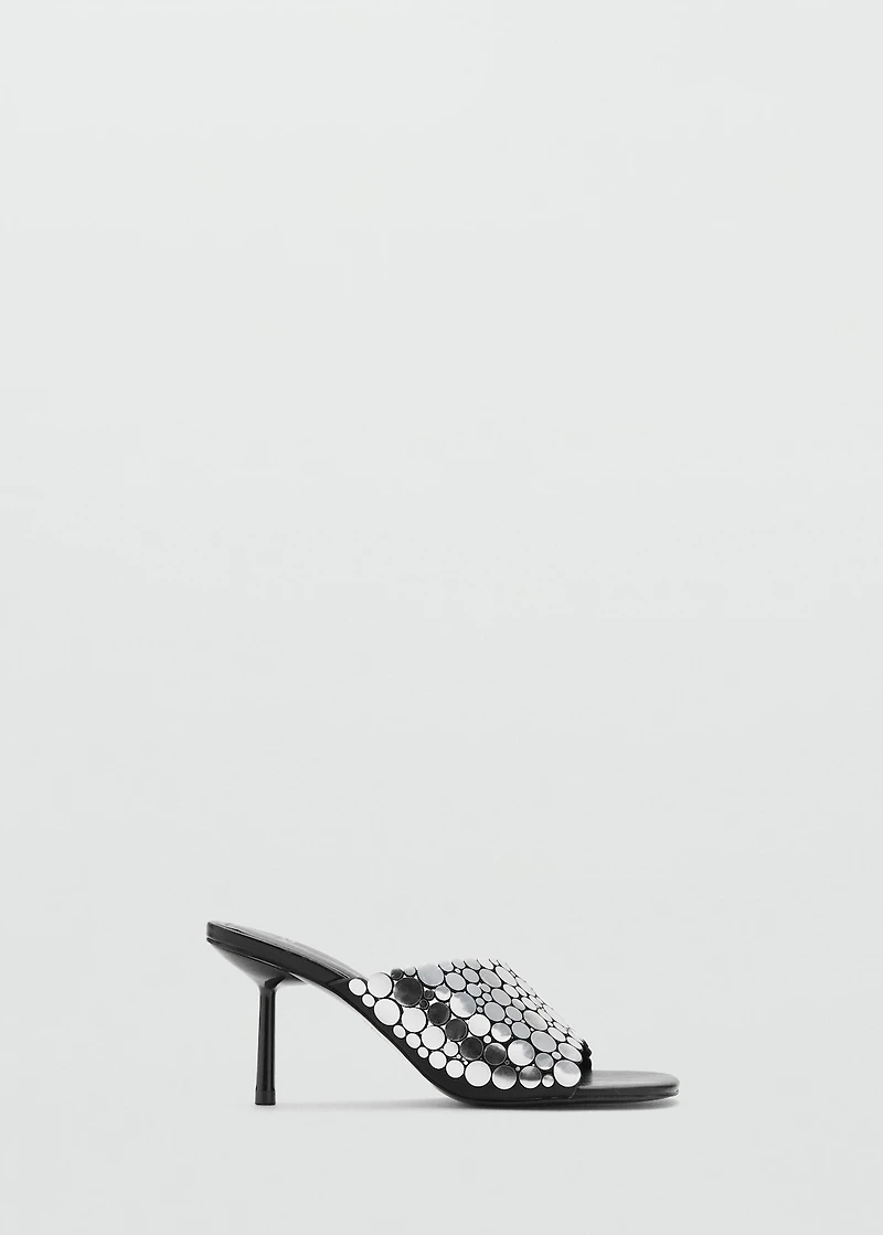 Heeled sandals with metal decorations