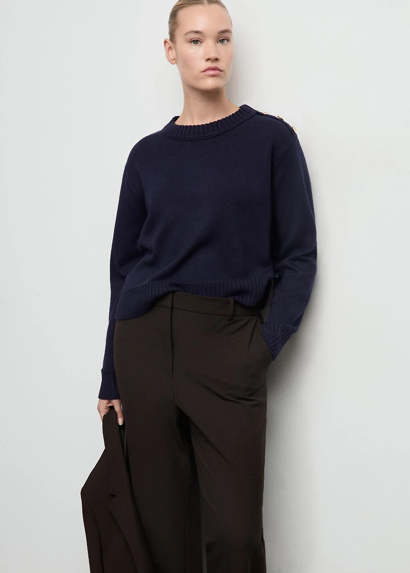 Knitted sweater with jewel buttons