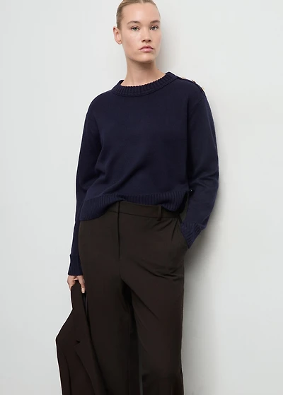 Knitted sweater with jewel buttons