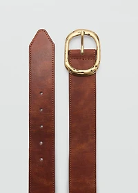 Textured belt with buckle