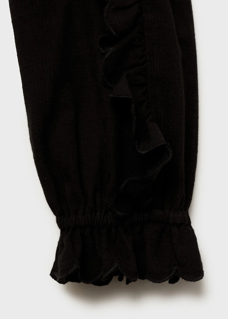 Ruched blouse with ruffles