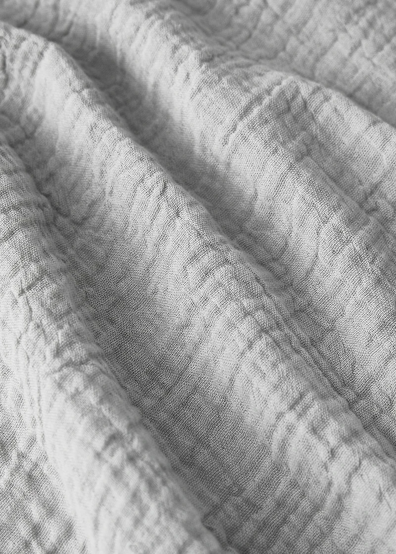 Cotton chiffon top sheet with contrast piping for cot