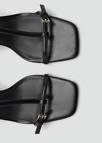 High-heeled sandals with buckle straps