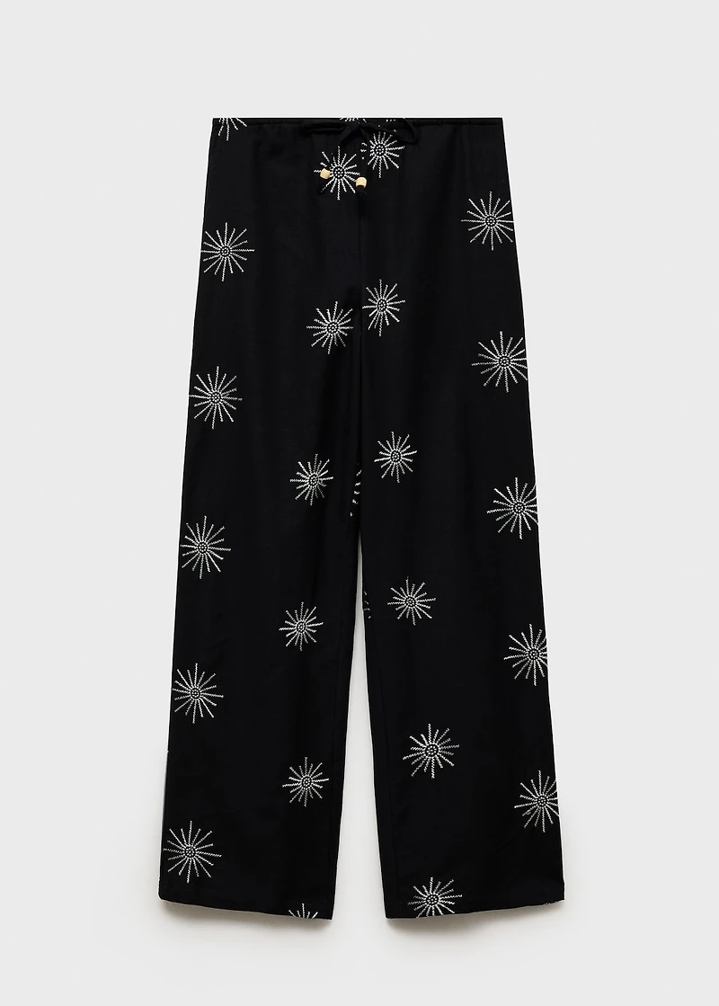 Long pants with embroidered details
