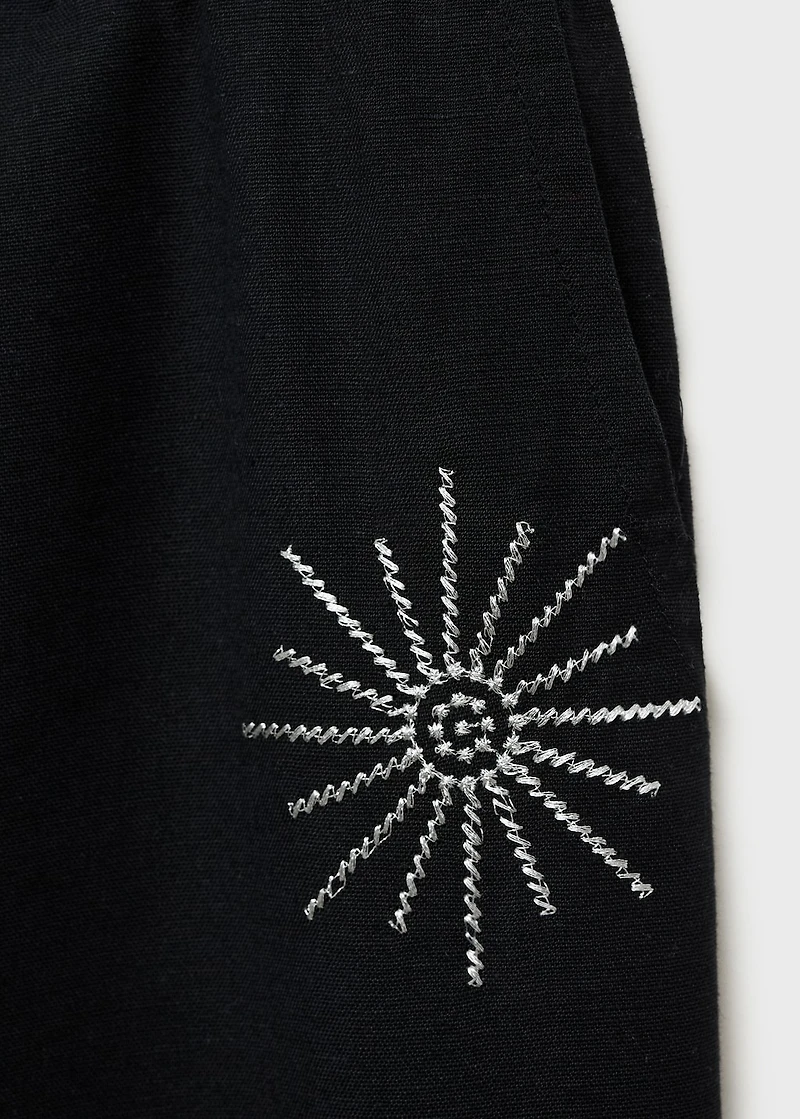 Long pants with embroidered details