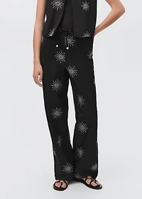 Long pants with embroidered details