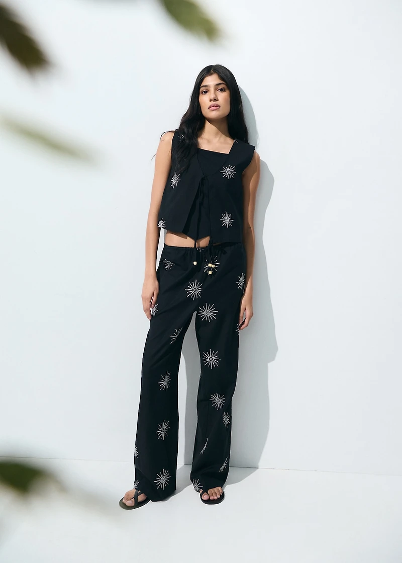 Long pants with embroidered details