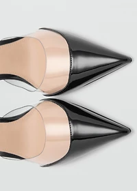 Heeled shoes with vinyl panel