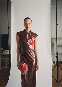 Dress with sequinned flower design