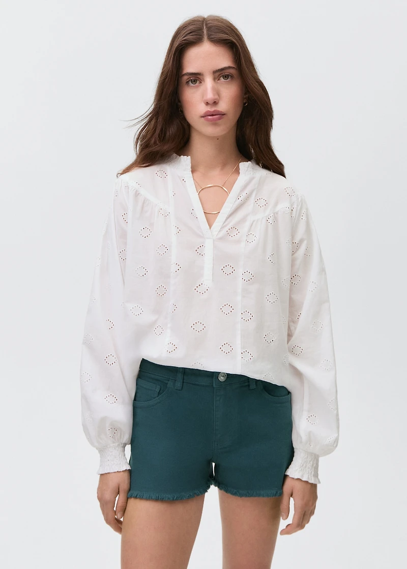 Denim shorts with frayed hem