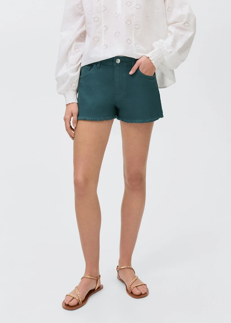 Denim shorts with frayed hem