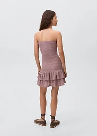 Short ruched dress with ruffled hem