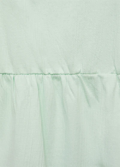 Top with Swiss embroidery detail