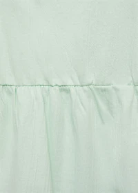 Top with Swiss embroidery detail