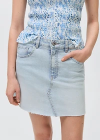 Denim miniskirt with frayed hem