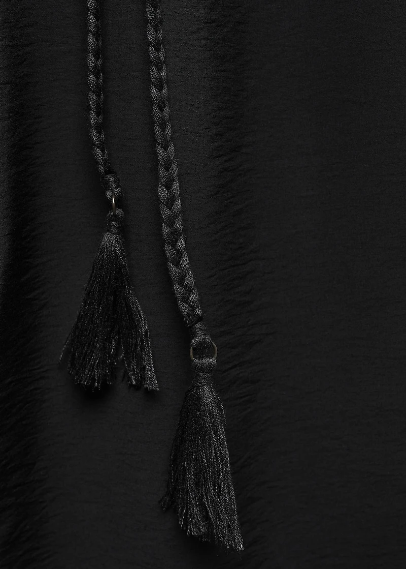 Long jumpsuit with tassel belt