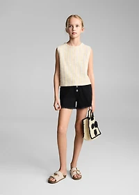 Denim shorts with frayed hem