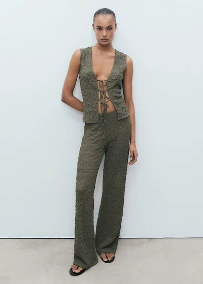 Textured top with bow