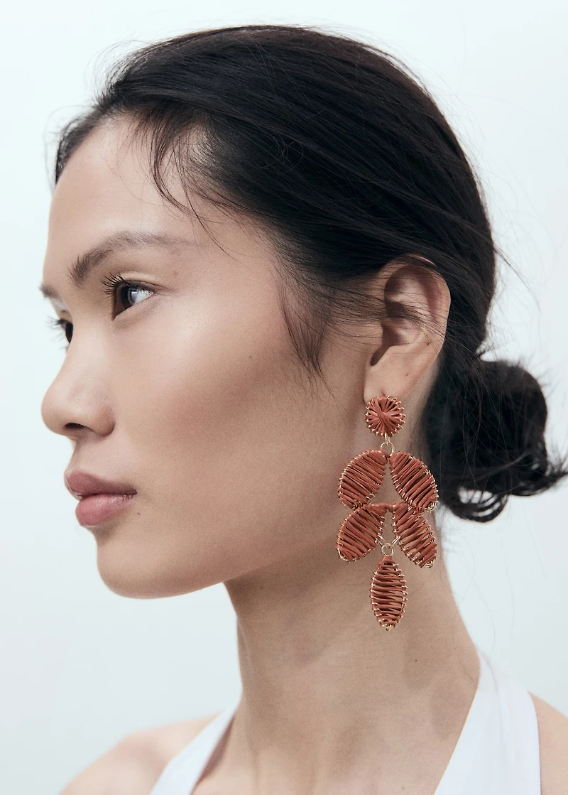Long floral-design earrings