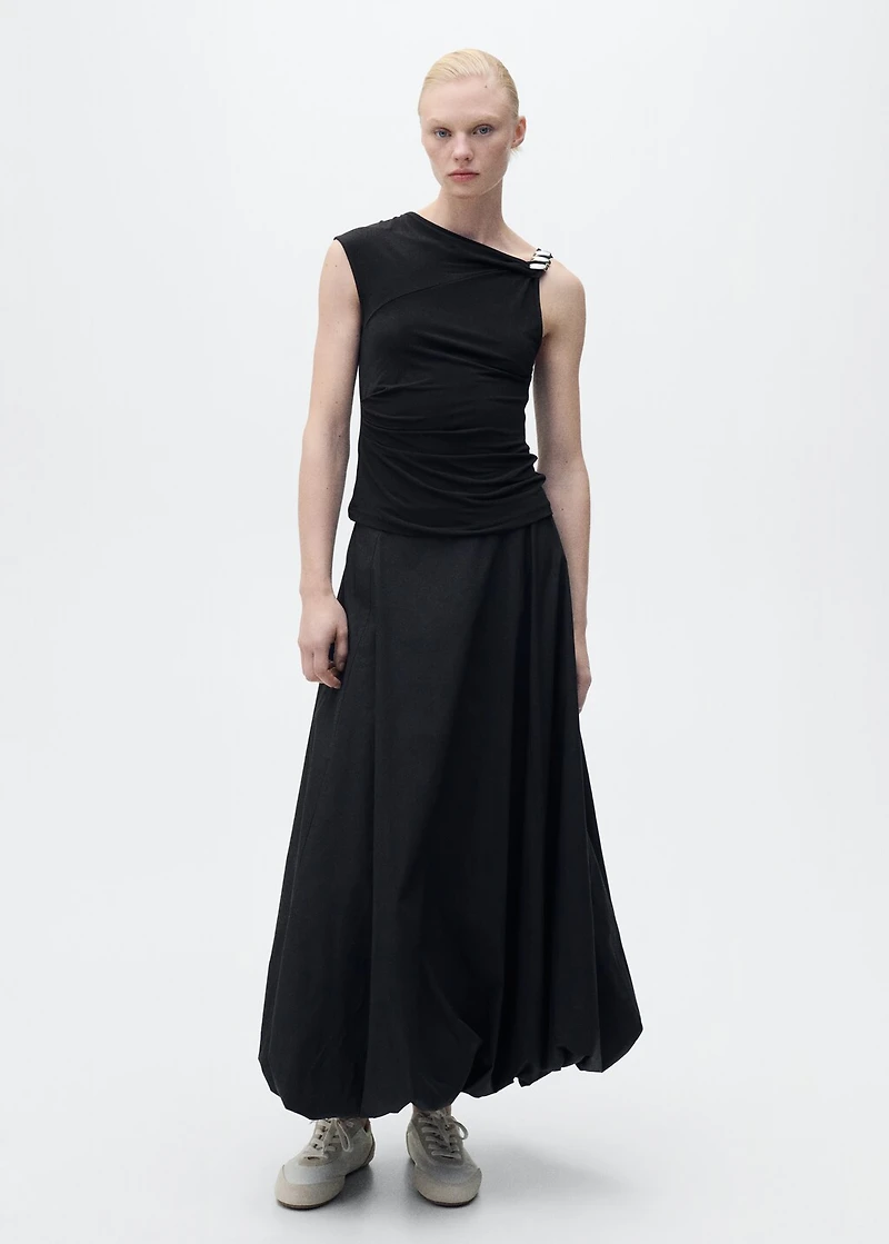 Asymmetrical top with metallic appliqué