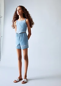 Denim jumpsuit with embroidered detail