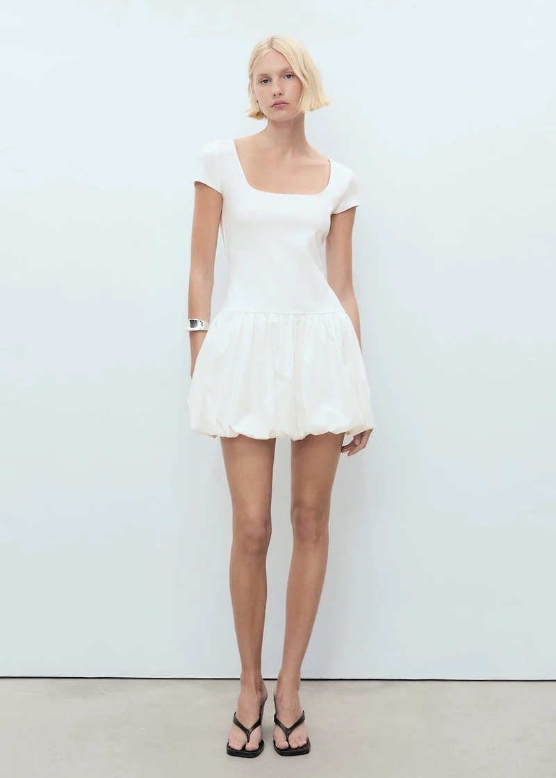 Combined dress with puffed hem