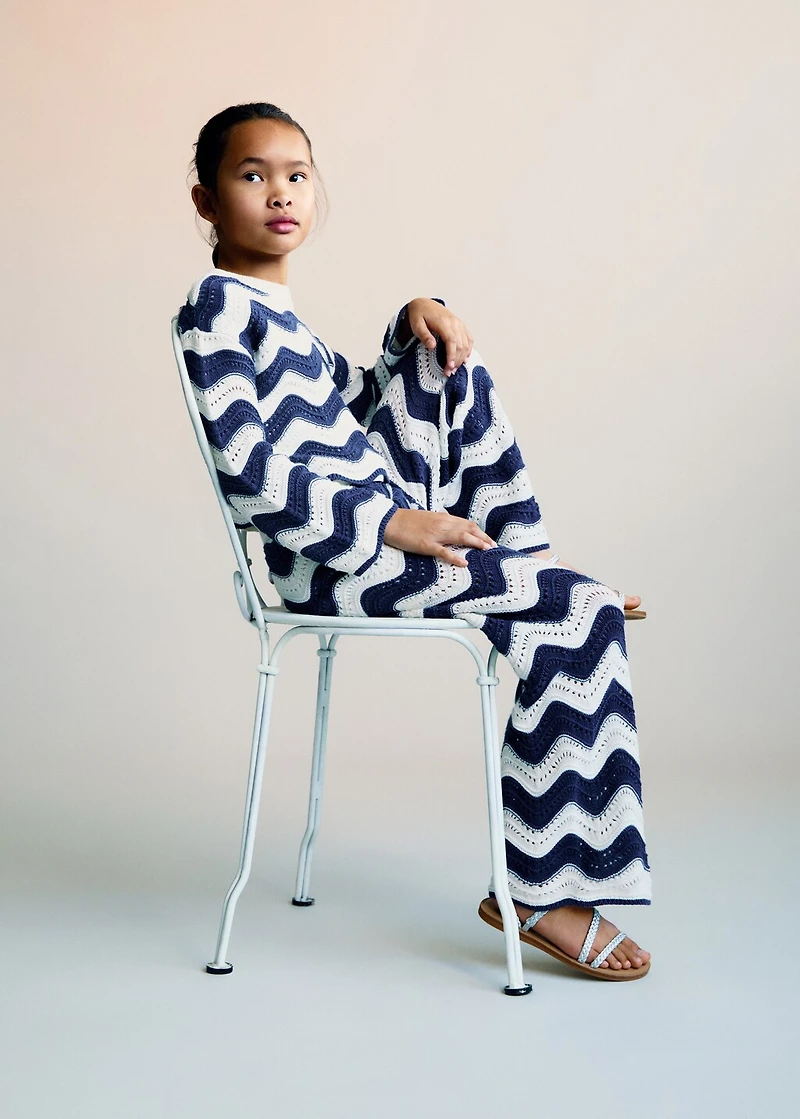 Zig-zag knitted pants with lace accents