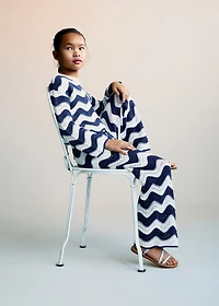 Zig-zag knitted pants with lace accents