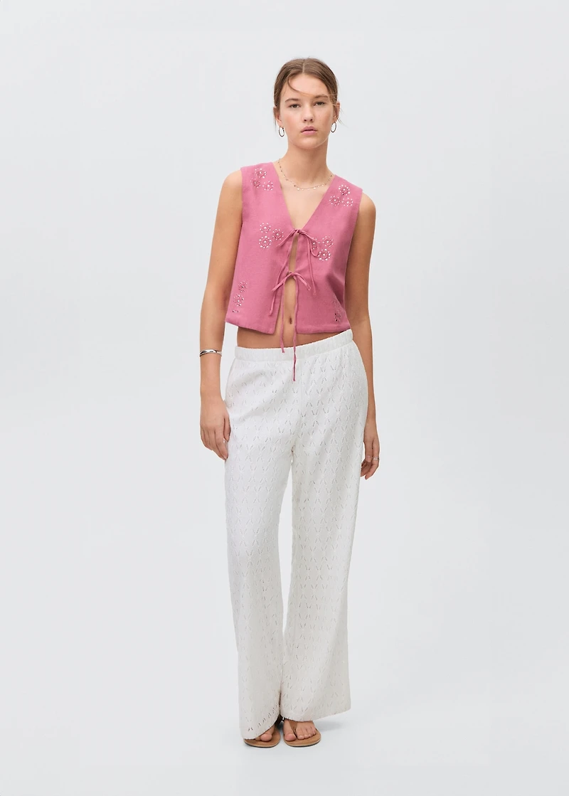 Embroidered vest with bows