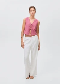 Embroidered vest with bows