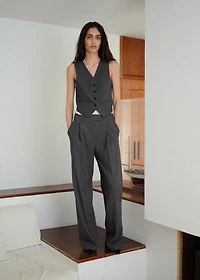 Vest with adjustable belt