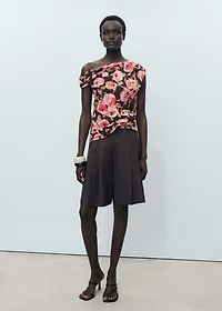 Floral blouse with asymmetrical neck