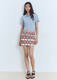 Knitted polo-neck sweater