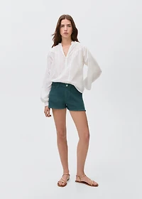 Denim shorts with frayed hem