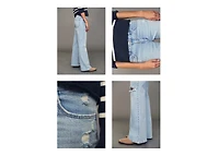 Flared jeans with decorative rips