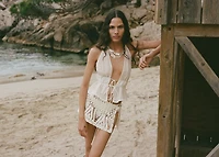 Crochet bow mini-skirt