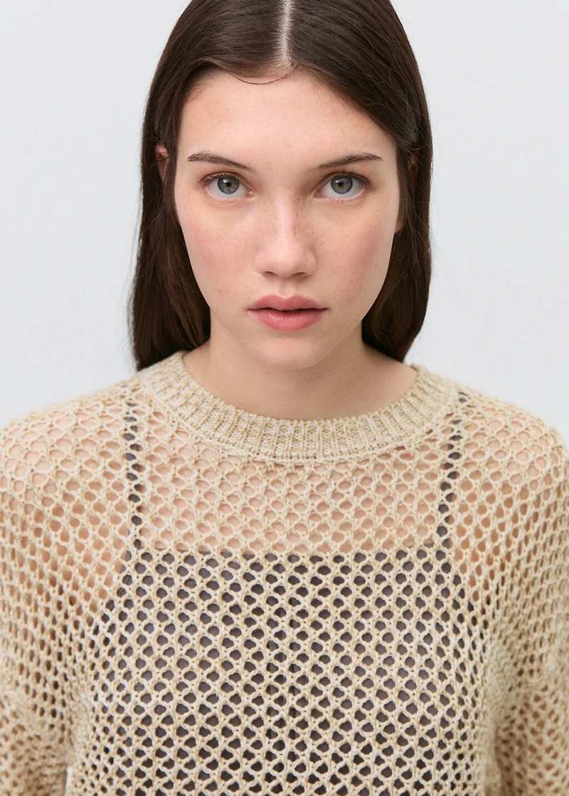 Knit sweater with lace pattern