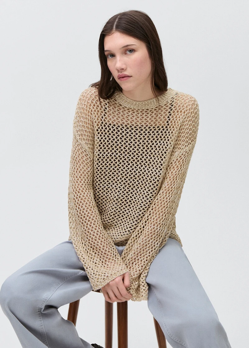 Knit sweater with lace pattern