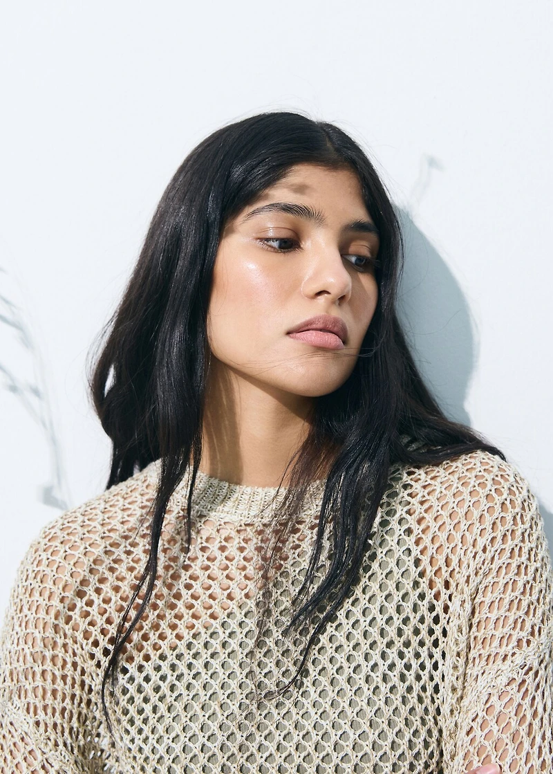 Knit sweater with lace pattern