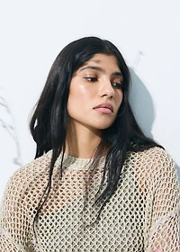 Knit sweater with lace pattern