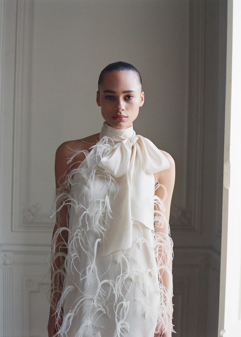 Halter dress with feather decoration