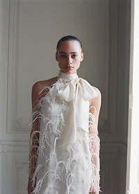 Halter dress with feather decoration