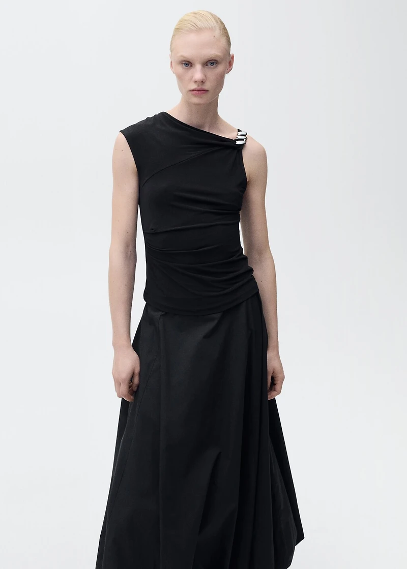 Asymmetrical top with metallic appliqué