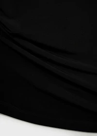 Asymmetrical top with metallic appliqué